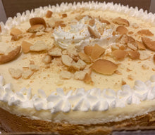 Load image into Gallery viewer, Banana Cream Cheesecake with whipped cream
