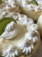 Load image into Gallery viewer, Mini 4-inch Key Lime Cheesecake with whipped cream