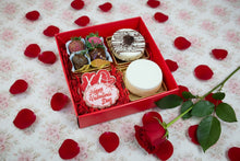Load image into Gallery viewer, Valentine’s gift dessert box with chocolate dipped strawberries, cheesecakes, and decorated sugar cookies.

